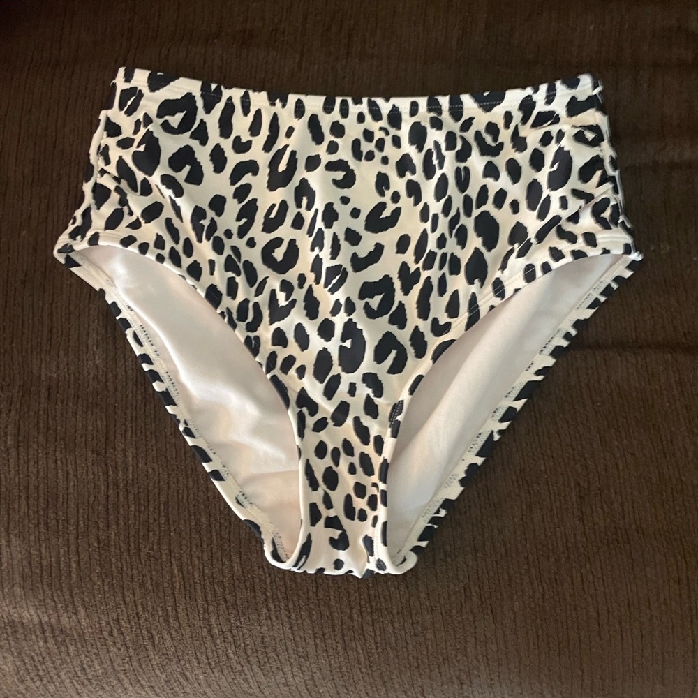 Small swim bottoms. Target. Never worn but washed and no tags.